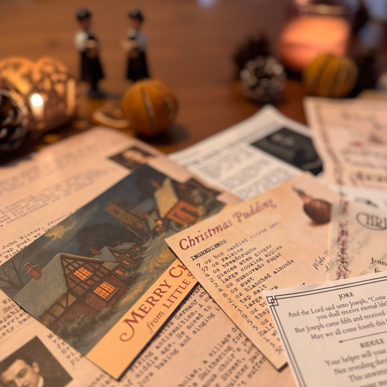 Vintage Christmas murder mystery game on a wooden surface with blurred background
