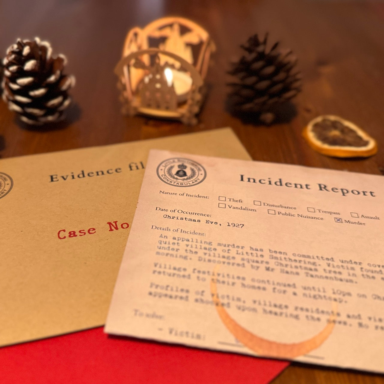 Vintage murder mystery game with incident report. On a wooden surface with decorative elements