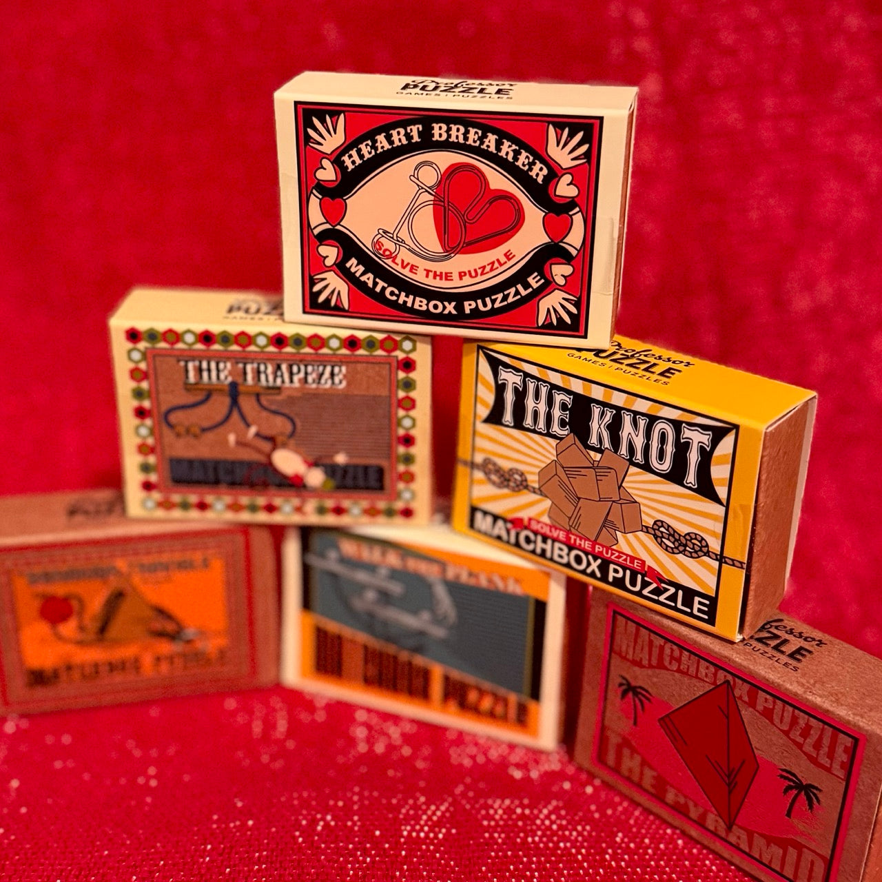 A vintage matchbox puzzle brainteaser (various designs, included in Partner in Crime Gift Box