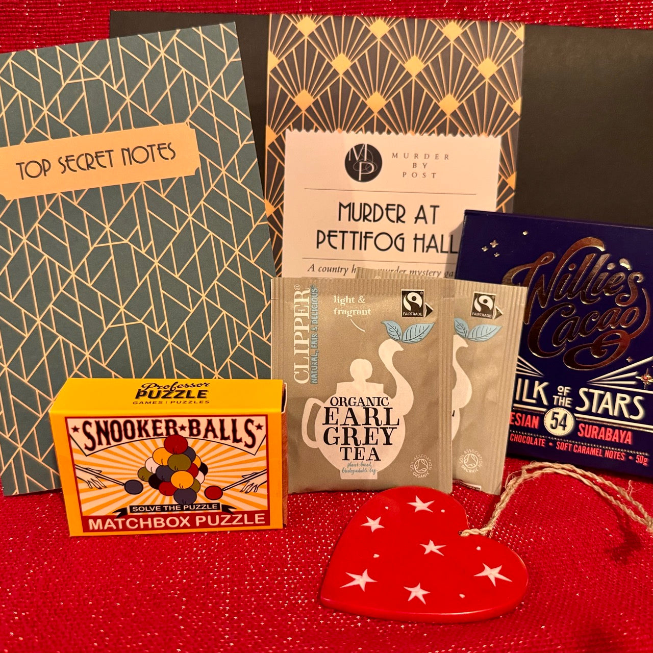 Various items included in Partner in Crime Gift Box