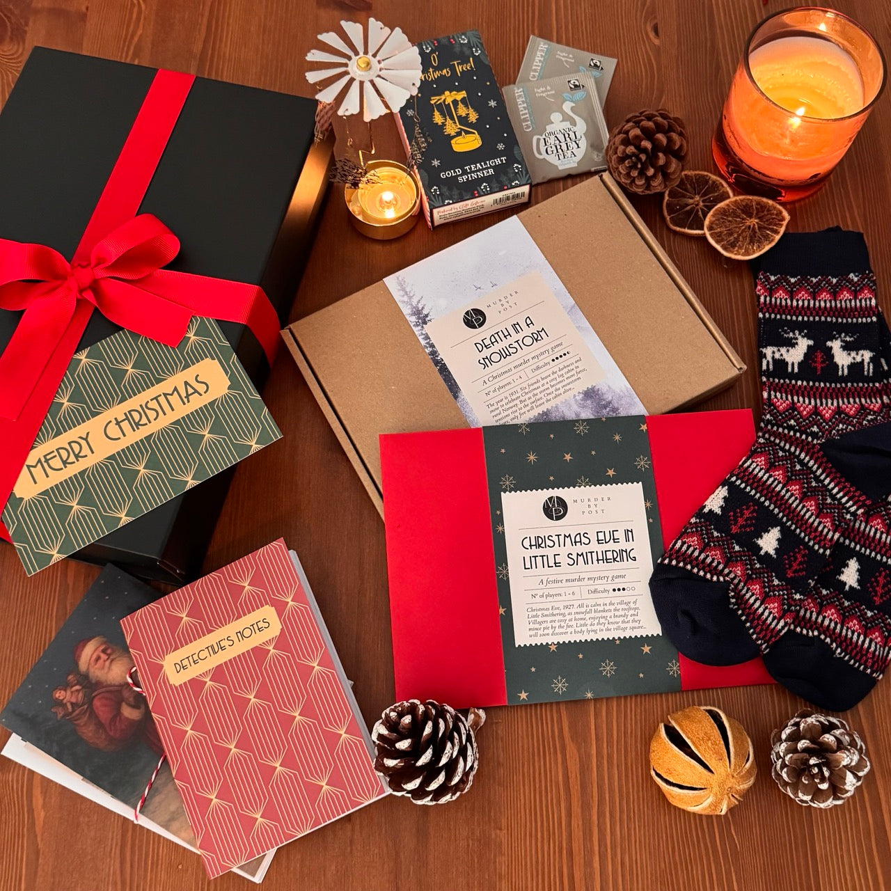 Overview of items included in the cozy murder mystery gift box.