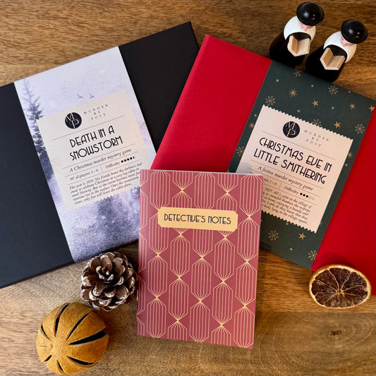 The picture shows 3 products and decorations: Murder mystery Advent Calendar 'Death in a Snowstorm', the festive murder mystery game 'Christmas Eve in Little Smithering' and an art deco notebook.