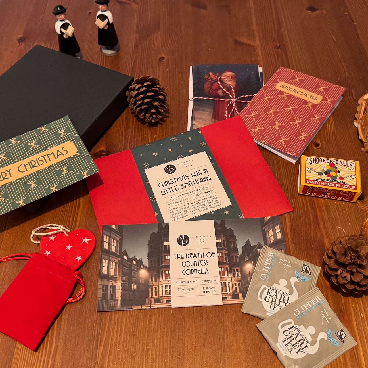 Picture of games and gifts included in the Little Christmas Gift Box