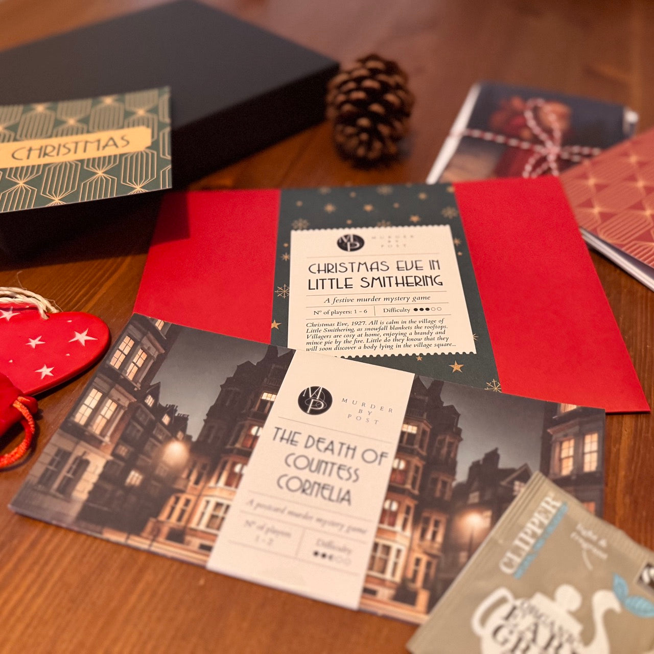 Picture of games and selected gifts included in the Little Christmas Gift Box