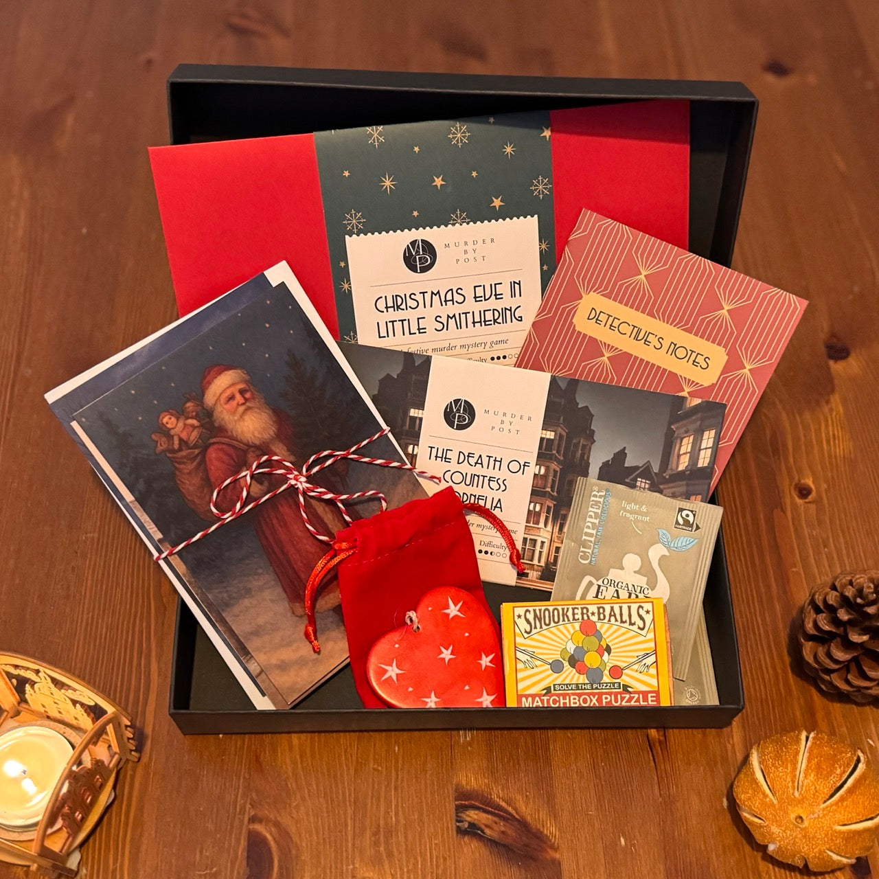 Picture of open Little Christmas Gift Box, showing games and gifts included in the box