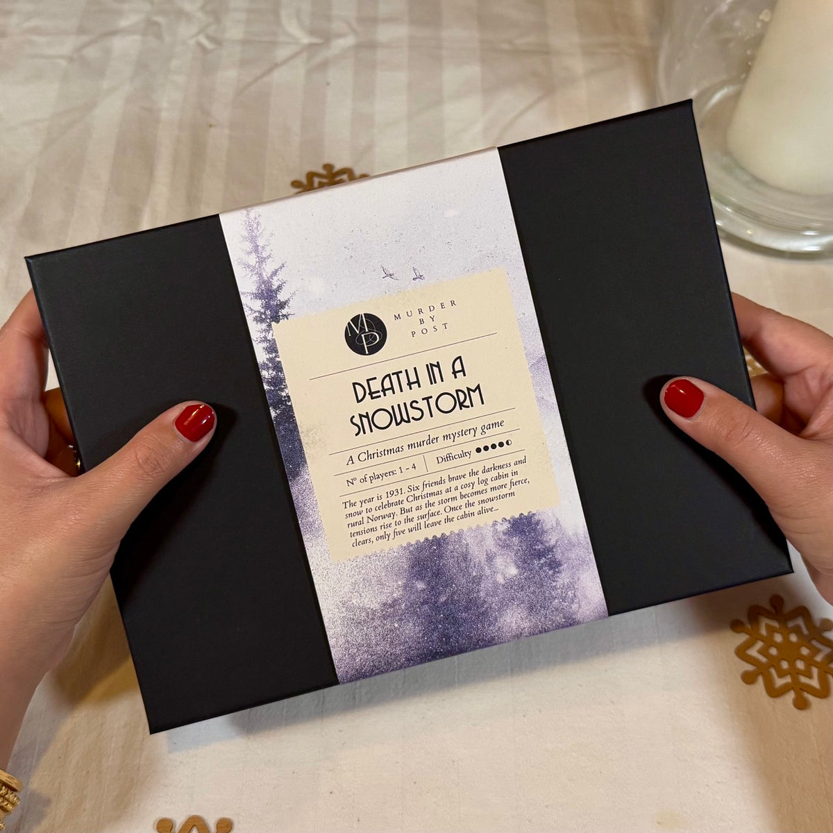 Outside box of Murder Mystery Advent Calendar called 'Death in a Snowstorm